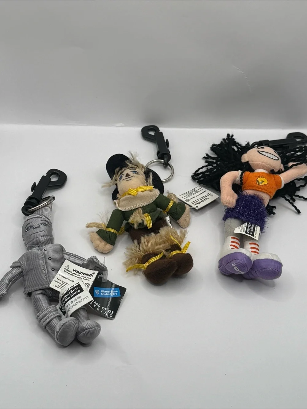 Vintage Warner Bros Keychains Lot Wizard of Oz Tin Man and Scarecrow and WB Girl